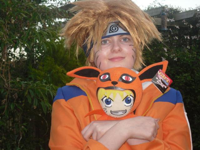 Naruto holding evil kyuubi